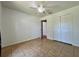 Bedroom with double closet and tile flooring at 955 Thelma St, Orange City, FL 32763