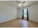 Bedroom with neutral paint and ceiling fan at 955 Thelma St, Orange City, FL 32763
