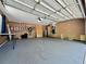Spacious garage with ample storage and access to utilities, ready for customization at 955 Thelma St, Orange City, FL 32763