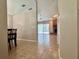 Open-concept living area with tile flooring and a view of the fireplace and backyard at 955 Thelma St, Orange City, FL 32763
