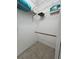 Walk-in closet with wire shelving and tile flooring at 955 Thelma St, Orange City, FL 32763