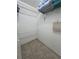 Walk-in closet with wire shelves and tile flooring at 955 Thelma St, Orange City, FL 32763