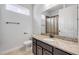 Updated bathroom featuring granite countertops, a neutral color scheme, and a window at 101 Briargate Look, Ormond Beach, FL 32174