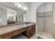 Bathroom with expansive vanity area, walk-in shower, and soaking tub at 101 Briargate Look, Ormond Beach, FL 32174