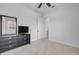 A bright bedroom with neutral carpet features a black dresser at 101 Briargate Look, Ormond Beach, FL 32174