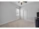 Bedroom featuring neutral walls, carpet floors, and window with custom blinds at 101 Briargate Look, Ormond Beach, FL 32174