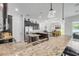 Gourmet kitchen with granite countertops, stainless steel appliances, and an open layout concept at 101 Briargate Look, Ormond Beach, FL 32174