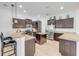 Modern kitchen featuring granite countertops, stainless steel appliances, and ample cabinet space at 101 Briargate Look, Ormond Beach, FL 32174