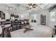 Open-plan living area with views of the kitchen, dining area, and outdoor patio through sliding glass doors at 101 Briargate Look, Ormond Beach, FL 32174