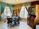 Cozy dining room featuring a wooden table and chairs, perfect for Gathering meals at 1025 Persian St, Deltona, FL 32725
