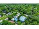 Neighborhood aerial view showcasing well-maintained homes and lush greenery at 1056 Stevens St, Lake Helen, FL 32744
