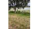 Backyard view of the water and small deck with railings at 1118 Prescott Blvd, Deltona, FL 32738
