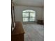 Bedroom with large window and dresser at 1118 Prescott Blvd, Deltona, FL 32738
