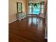 Shows a dining room with hard wood flooring at 1118 Prescott Blvd, Deltona, FL 32738