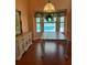 Shows a dining room with hard wood flooring and plenty of natural light at 1118 Prescott Blvd, Deltona, FL 32738