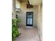 The front door shows brick facade and landscaped yard at 1118 Prescott Blvd, Deltona, FL 32738