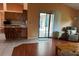 An open concept living room with a sliding glass door at 1118 Prescott Blvd, Deltona, FL 32738