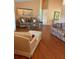 Comfortable living room with hardwood floors, neutral decor, and plenty of seating at 1118 Prescott Blvd, Deltona, FL 32738