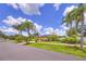A charming single-story home with solar panels, surrounded by meticulously maintained landscaping at 1131 Lemonwood Ave, Deland, FL 32724
