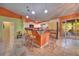 Bright kitchen with bar seating and a seamless flow to the dining area at 1131 Lemonwood Ave, Deland, FL 32724