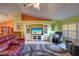 Cozy living room with plush seating, built-in shelving, and natural light at 1131 Lemonwood Ave, Deland, FL 32724