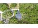 Overhead view of a home with mature trees and a circular driveway at 1155 Taylor E Rd, Deland, FL 32724
