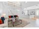 Bright and airy living room flows to the open kitchen with breakfast bar at 1155 Taylor E Rd, Deland, FL 32724