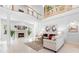 Bright, open living room features fireplace, soaring ceilings, and decorative accents at 1155 Taylor E Rd, Deland, FL 32724