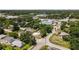 Overview of real estate surrounded by lush trees, highlighting its desirable neighborhood and nearby conveniences at 1214 Flomich St, Daytona Beach, FL 32117