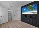 Stylish bedroom with modern accent wall, offering a trendy and comfortable retreat at 1214 Flomich St, Daytona Beach, FL 32117