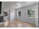 Bright bedroom with hardwood floors and natural light, creating a serene and inviting atmosphere at 1214 Flomich St, Daytona Beach, FL 32117