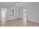 Room with tile floors, closet, and access to two other rooms at 1214 Flomich St, Daytona Beach, FL 32117