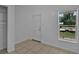 Room with tile floors, neutral paint, and natural light at 1214 Flomich St, Daytona Beach, FL 32117