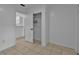 Room with tile floors, neutral paint, and access to storage at 1214 Flomich St, Daytona Beach, FL 32117
