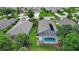 An aerial view of properties with lush surroundings at 1329 Sunningdale Ln, Ormond Beach, FL 32174