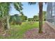 Backyard and garden area featuring lush landscaping at 1329 Sunningdale Ln, Ormond Beach, FL 32174