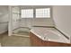 Well-lit bathroom featuring a glass-enclosed shower, a relaxing tub, and tiled flooring for a spa-like experience at 1329 Sunningdale Ln, Ormond Beach, FL 32174