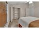 Serene bedroom with a closet, cozy bedding, and a sunlit window, perfect for relaxation and rest at 1329 Sunningdale Ln, Ormond Beach, FL 32174