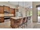 Well-equipped kitchen with a center island, stainless steel appliances, and convenient access to the dining area at 1329 Sunningdale Ln, Ormond Beach, FL 32174