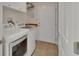 Laundry room with washer, dryer and tiled floor at 1329 Sunningdale Ln, Ormond Beach, FL 32174