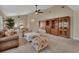 Spacious living room with a large window and french doors allowing for natural light at 1329 Sunningdale Ln, Ormond Beach, FL 32174