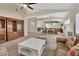 Spacious living room with high ceilings, neutral carpet, and abundant natural light at 1329 Sunningdale Ln, Ormond Beach, FL 32174