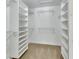Spacious walk-in closet with ample shelving and hanging space for optimal storage solutions at 1329 Sunningdale Ln, Ormond Beach, FL 32174