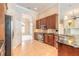 The kitchen has stainless steel appliances and granite countertops and cabinets at 15 Cambridge Trce, Ormond Beach, FL 32174