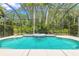 Beautiful backyard pool and outdoor spa area at 15 Cambridge Trce, Ormond Beach, FL 32174