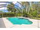 View of the screen enclosed pool and outdoor hot tub at 15 Cambridge Trce, Ormond Beach, FL 32174