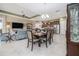 Spacious dining area next to the living room and kitchen for seamless entertaining at 1653 Victoria Gardens Dr, Deland, FL 32724