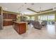 Spacious kitchen with large island, stainless steel appliances, and open layout to the living area at 1653 Victoria Gardens Dr, Deland, FL 32724