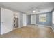 Bedroom features a ceiling fan, closet, and a water heater in the closet at 173 Cedar Ave, Orange City, FL 32763