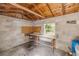 Interior view of shed with workbench, window and water tank at 173 Cedar Ave, Orange City, FL 32763